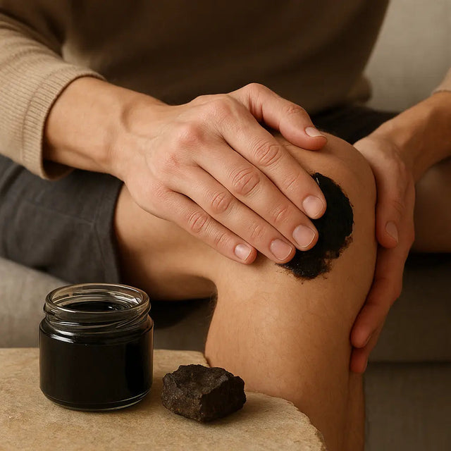 shilajit for joint pain and mobility - jar of pure Himalayan shilajit resin on stone