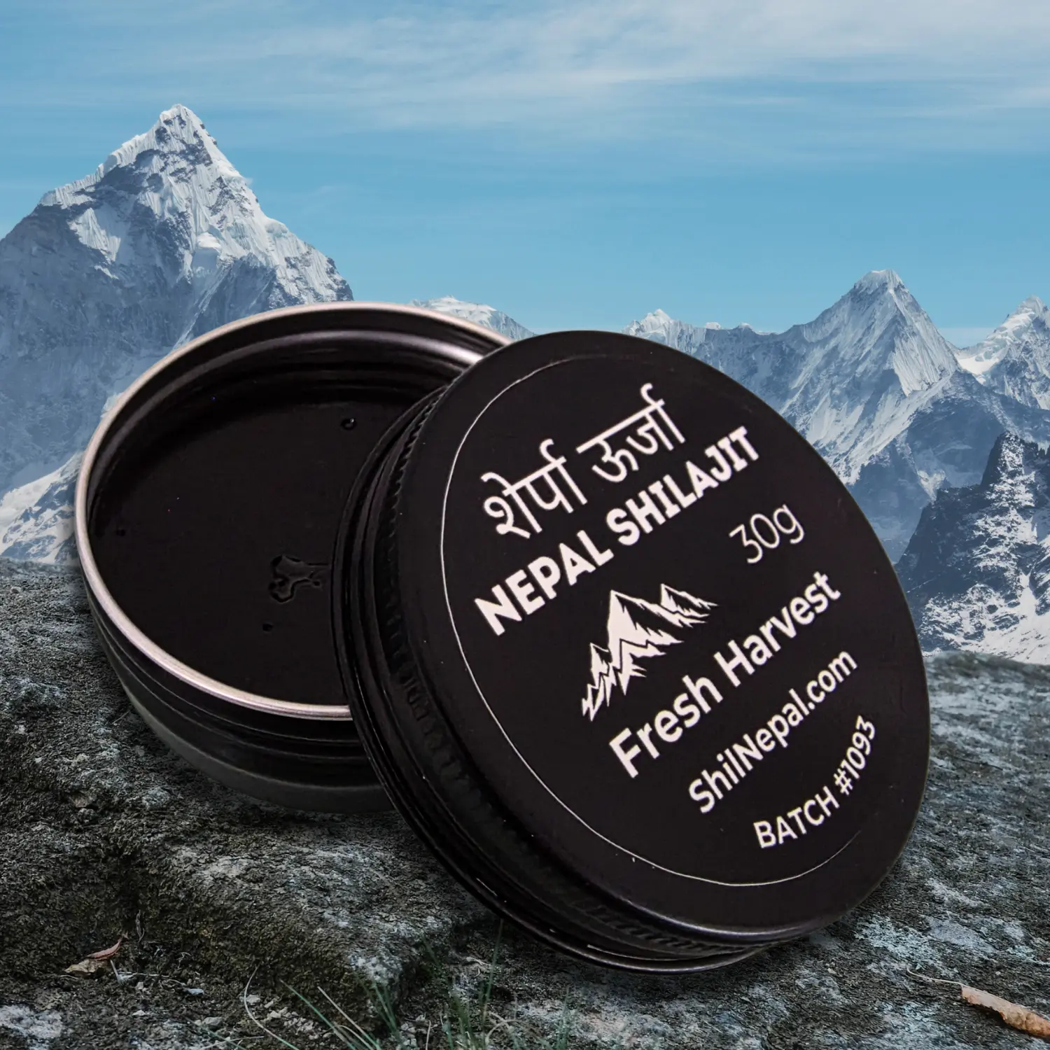 Nepal Shilajit container with mountainous landscape in the background